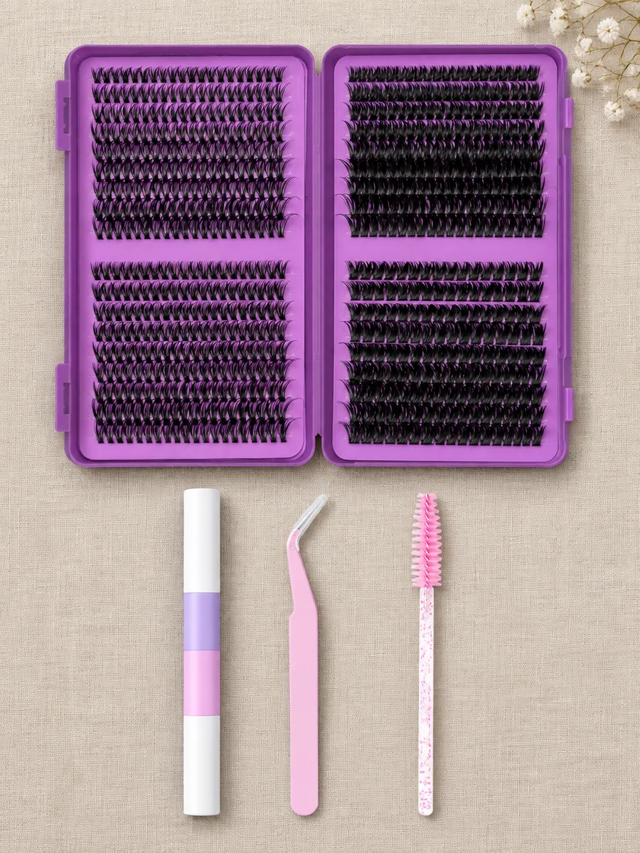 Everything in the box: four trays of lash clusters, the bond and seal pen, the tweezer and the lash brush