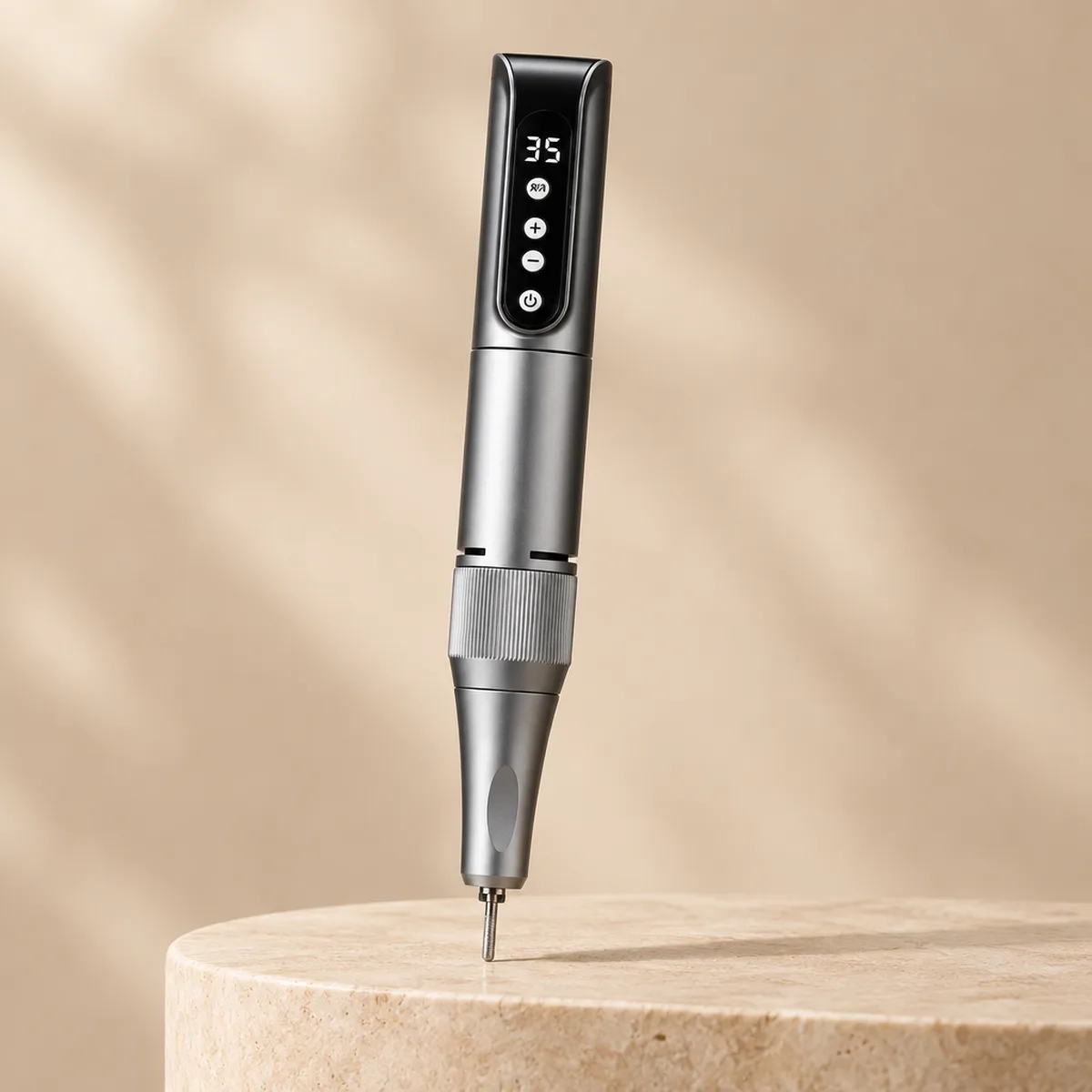 The Nail Drill in grey, standing upright, its display reading 35